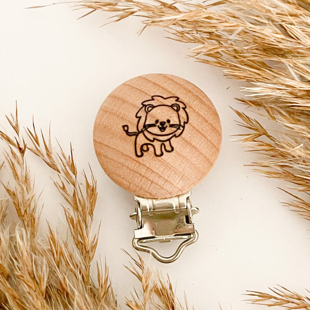 Runder Holzclip mit verschiedenen Motiven